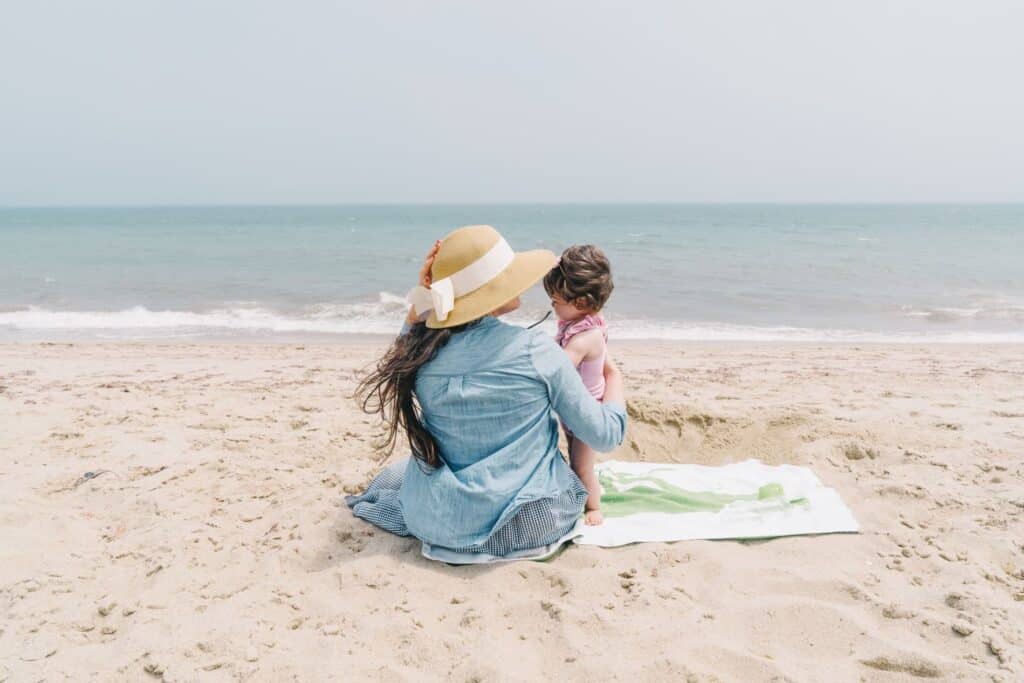 mom and baby wearing EWG Approved Sunscreen List 