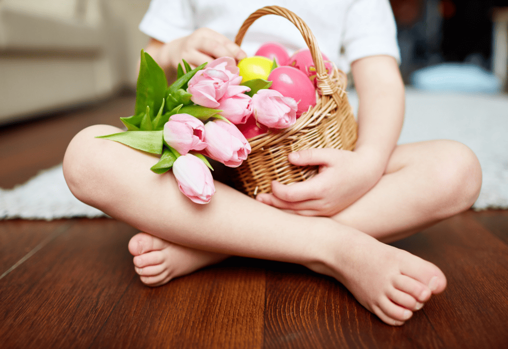child holding wooden Easter basket