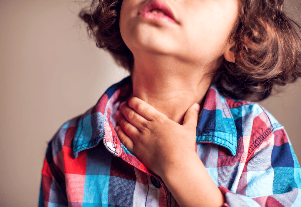 boy with sore throat treatment at home