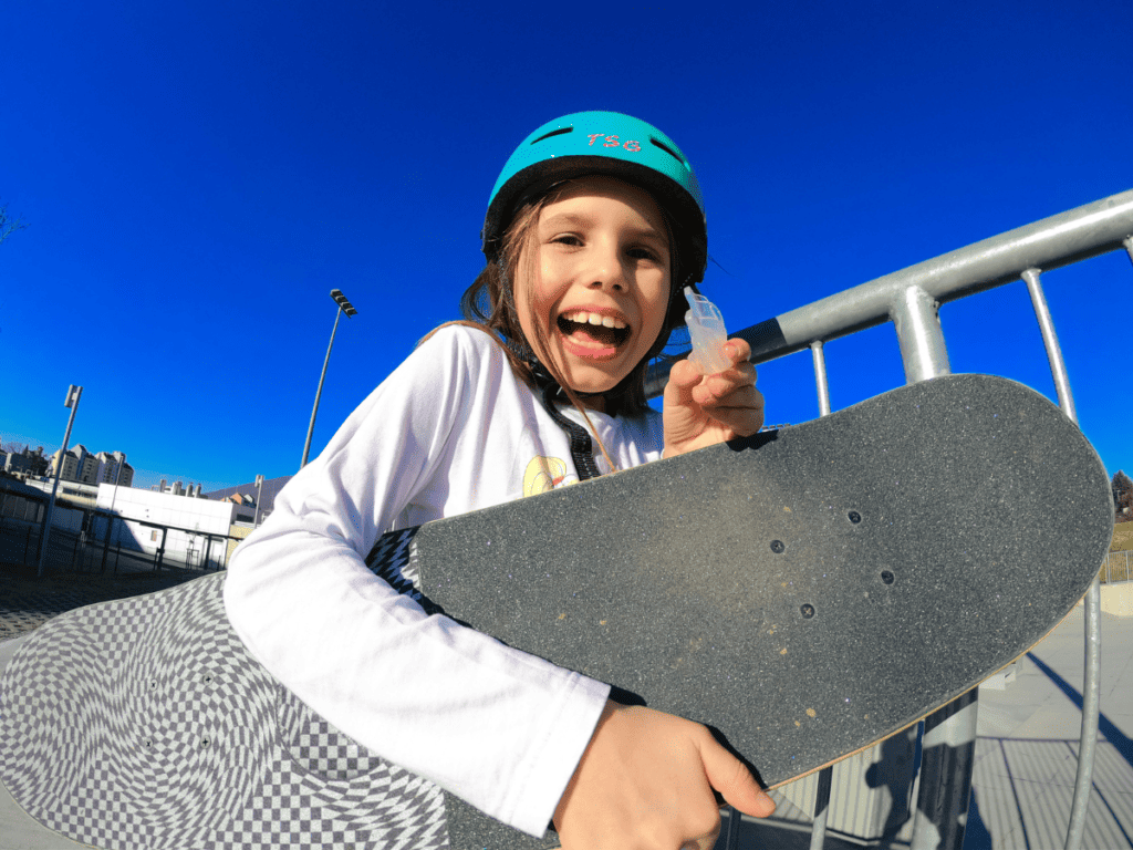 girl wearing non-toxic sports mouth guard